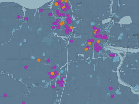 This is a photo of primary and secondary schools that do and do not have food programs in Niagara.The purple circles represent schools that have food programs and orange circles represent schools that do not.
